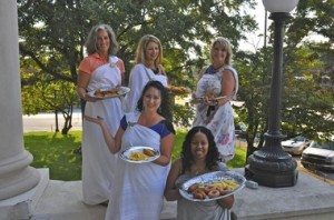 Athens Grease Festival organizers pose with fried delights at the historic Limestone County Courthouse in downtown Athens. Back row from left, Betsy Hyman, Christy Hubbard and Trisha Black. Front row from left, Holly Hollman and Letisha Brinkley. (The Huntsville Times/courtesy photo)