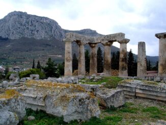 Ruins of the Temple of Apollo within the polis of Ancient Corinth, built c. 540 BC, with the Acrocorinth (the city's acropolis)