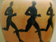 Three runners featured on an Attic black-figured Panathenaic prize amphora.